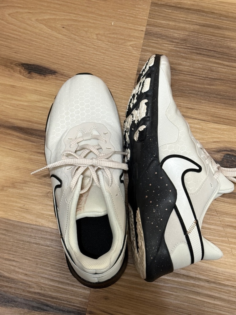 9 women’s Nike Off-White/Black React Element Style Sneakers